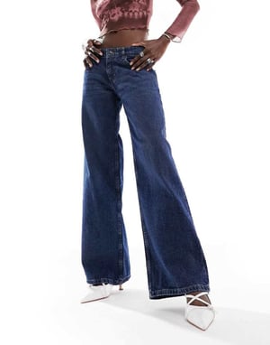 Motel extra wide low rise jeans in mid blue used wash