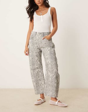 Free People good luck printed barrel jean in snake combo