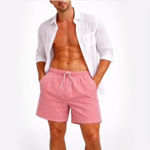 Seersucker swimshorts in rede and white fine stripe and front tie