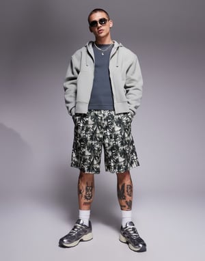 Armani Exchange shorts in green palm print