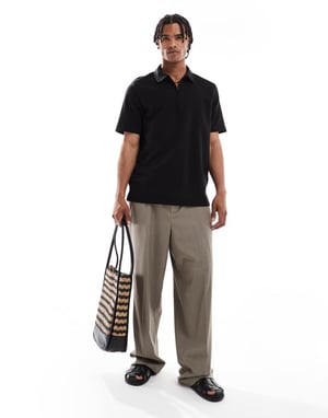 Jack & Jones texturerad zip polo i svart