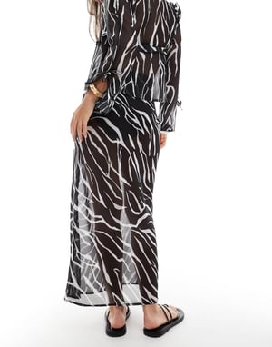 Esmee Exclusive sheer tie front beach skirt in zebra