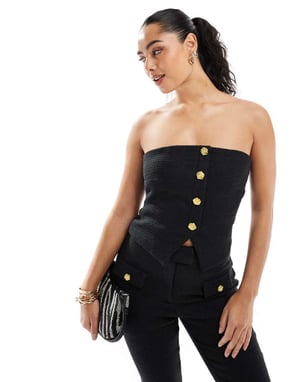 The Frolic exclusive tailored boucle bandeau split front gold flower button detail top co-ord in black
