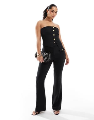 The Frolic exclusive tailored boucle bandeau split front gold flower button detail top co-ord in black