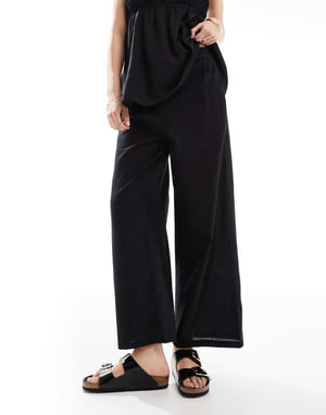 Esmee Exclusive relaxed leg linen look trousers in black