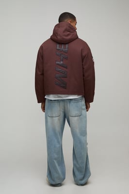 Oversized MAN Applique Twill Hooded Peaked Cagoule