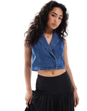 ASOS DESIGN denimväst i mellanhav blå