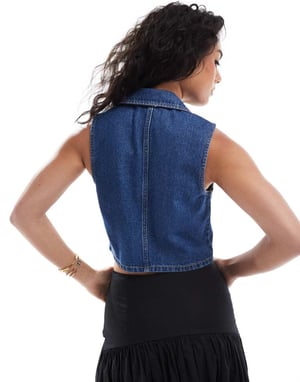 ASOS DESIGN denimväst i mellanhav blå