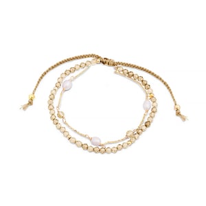 Luxenter athat armband tillverkat av metallegering och champagnezirkonia 18K guldpläterad finish