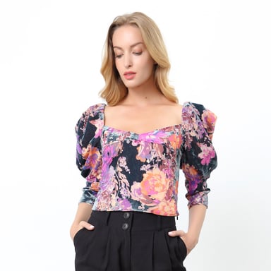 Top style 80's with floral print and puffy sleeves