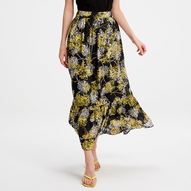 Long skirt with linear print and ruffles