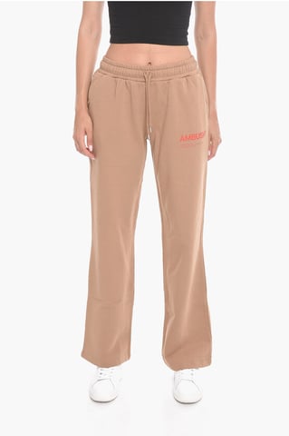 Wide-leg WORKSHOP Joggers with Logo Print in Beige