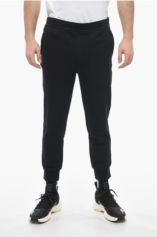 Skinny joggingbroek van katoen met boorden in zwart