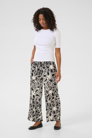 Casual pants Loose fit Black / Light Beige Flower