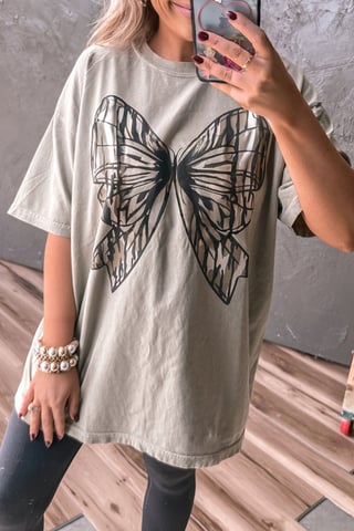 Casual Oversized T-shirt met Grote Strik Bedrukking en Vallen Schouders