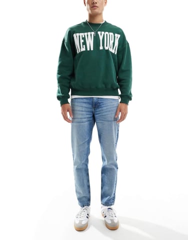 ASOS DESIGN tapered jeans in mid wash blue