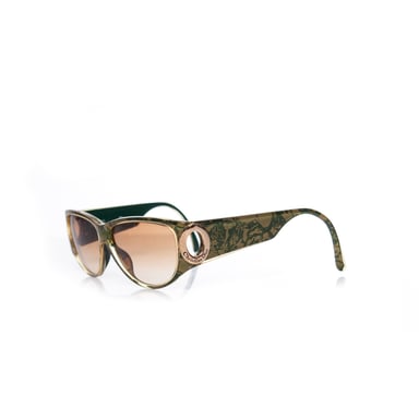 Christian Dior Vintage sunglasses in green and gold.
