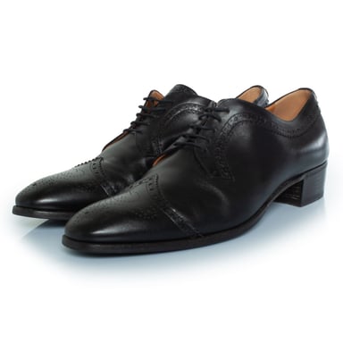 Gucci Lace up brocade with gold studded heel