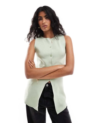ASOS DESIGN knitted crew neck waistcoat with front split in pistachio