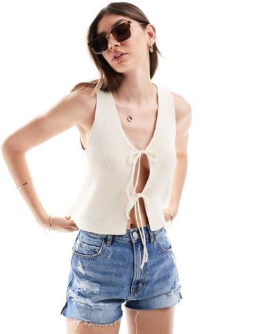 ASOS DESIGN knitted waistcoat with tie front in cream