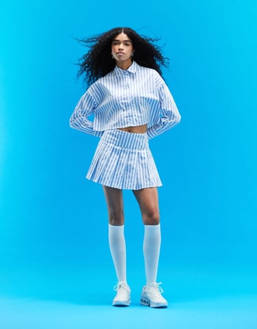 ASOS DESIGN kort plisserad mini kjol i bomullspoplin med rand - MULTIFÄRGAD