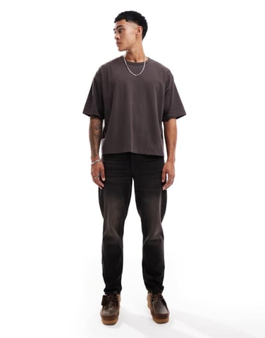 ASOS DESIGN tapered fit in washed black with brown tint - BROWN