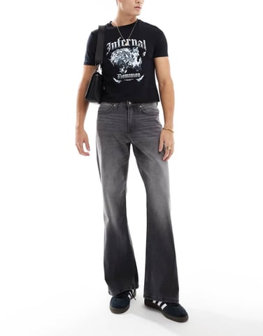 ASOS DESIGN wide flare jeans in washed black