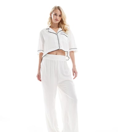 ASOS DESIGN Tall super soft slinky wide leg pyjama trouser in white with contrast binding