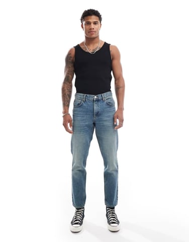 ASOS DESIGN tapered fit jeans in dark wash blue tint