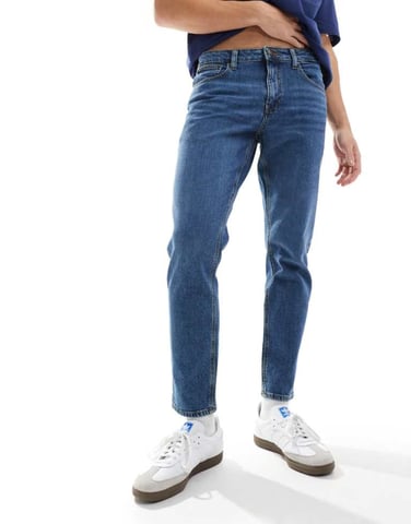 ASOS DESIGN stretch tapered jeans in dark wash blue