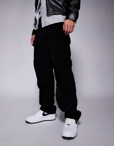 ASOS DESIGN baggy kordbyxor med fickor i svart