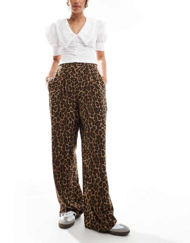 ASOS DESIGN relaxed pull on trousers in animal print