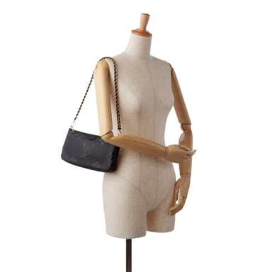 Pochette Mtis Crossbody-väska M44875