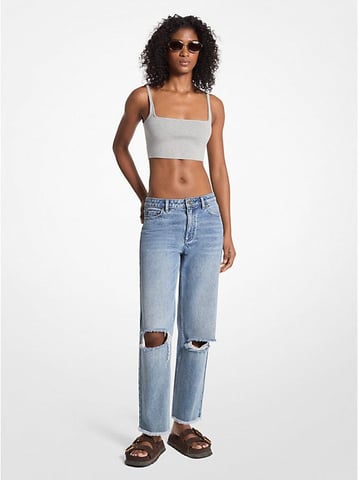 Fransad slitna jeans