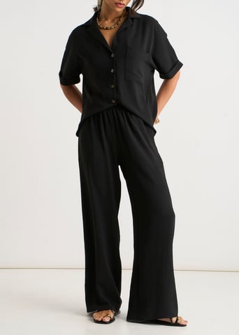 Zwarte elastische taille broek met wijde pijpen