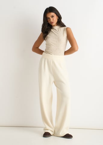 Off-white gebreide broek met wijde pijpen en elastische tailleband