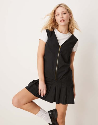 ASOS DESIGN zip through mini twill pinny dress with pleated skirt in black
