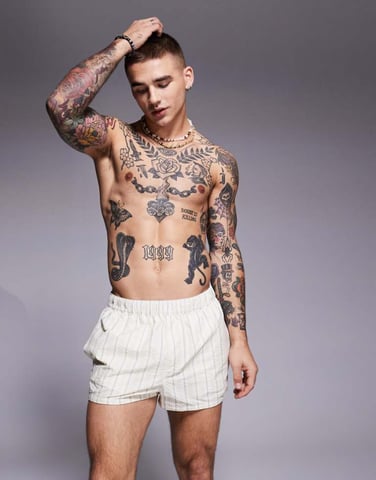 ASOS DESIGN seersucker stripe swim shorts in super short length in stone