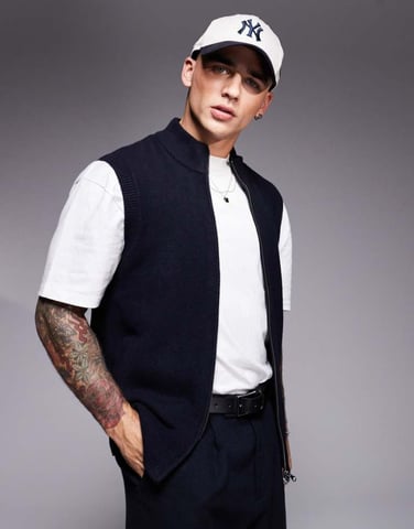 ASOS DESIGN knitted zip thru tank with funnel neck in navy