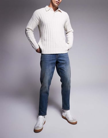 ASOS DESIGN stretch tapered jeans in mid wash with tint