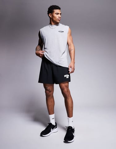 4505 loose fit quick dry graphic training shorts with zip pockets in black