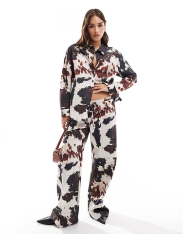 ASOS DESIGN poplin wide leg trouser in cow print