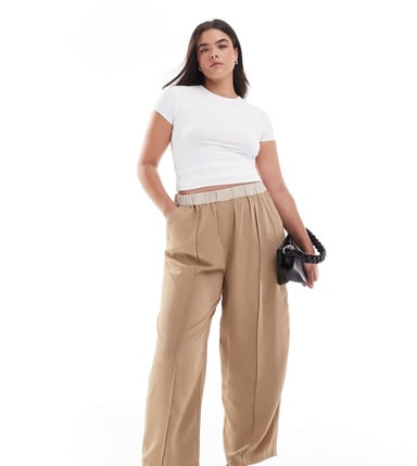 ASOS DESIGN Curve cropped pull on trousers with contrast waist in camel