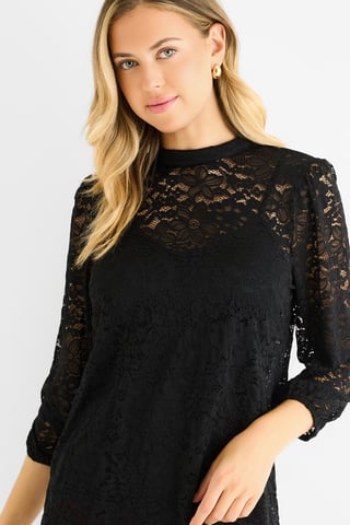 Zwarte jerseyblouse met hoge hals en kant, losse pasvorm