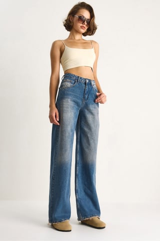 Högmidjade vida jeansbyxor