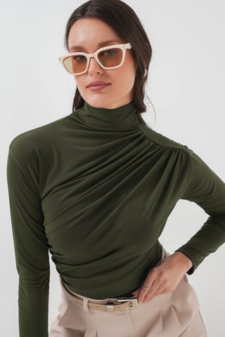 Fitted Turtleneck Blouse with Drape Detail
