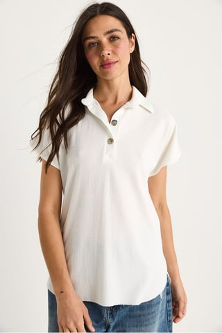 Avslappnad passform knäppbar polo t-shirt