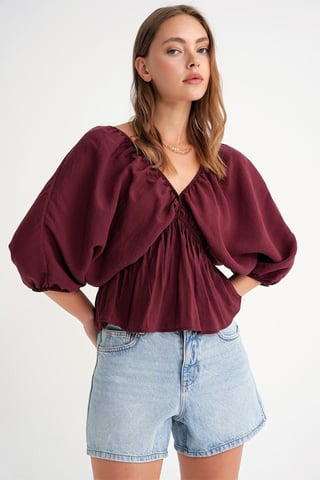 V-ringad Blus med Volangdetalj