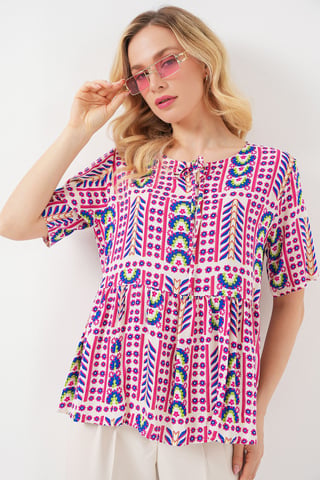 Patterned Crew Neck Blouse with Bow Detail