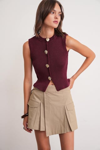 Texturerad stickad crop top med knapppdetaljer